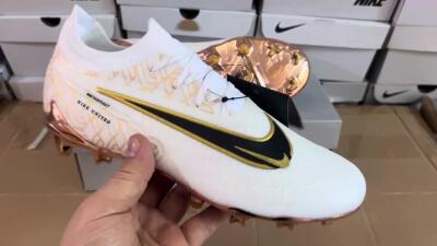 Men's Nike Phantom GX Elite United Golden Pack FG Football Boots - White/Metallic Gold/Black